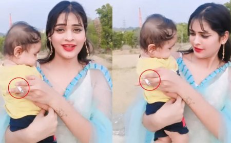 गोद में बच्चा लेकर सिगरेट पीते हुए महिला का वीडियो वायरल, वीडियो देख भड़के यूजर्स।