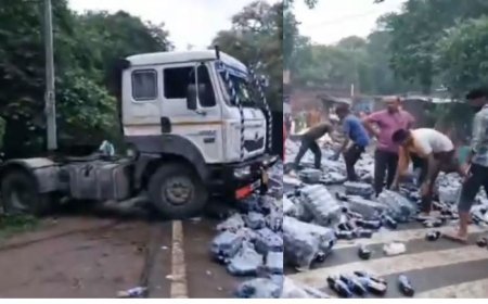 Ballia : तेज रफ्तार ट्रेलर पलटा, कोल्ड ड्रिंक लूट का वीडियो वायरल, महिला घायल