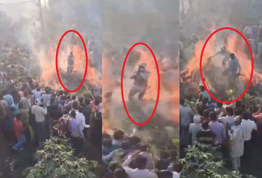 Sambhal: सम्भल में जलती होली पर चढ़ा शख्स, युवक ने खींचकर बचाई जान, वीडियो वायरल।