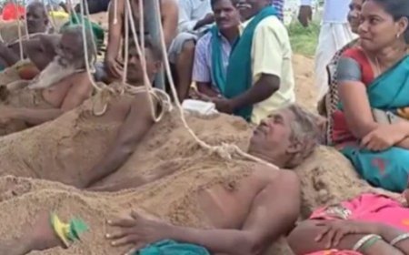 TN Farmers Protest: तमिलनाडु में किसानों का अनोखा प्रदर्शन, कावेरी पानी की मांग को लेकर नदी तट की रेत में खुद को गाड़ा