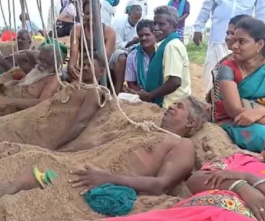TN Farmers Protest: तमिलनाडु में किसानों का अनोखा प्रदर्शन, कावेरी पानी की मांग को लेकर नदी तट की रेत में खुद को गाड़ा
