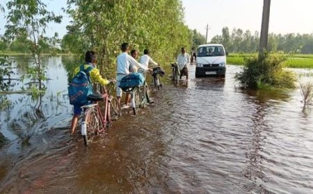 सीतापुर में चौका और केवानी नदी का कहर, जान हथेली पर रखकर स्कूल जा रहे बच्चे, ट्यूब के सहारे फसल बचाने में जुटे किसान