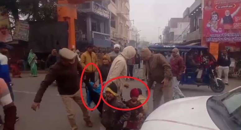 Lakhimpur-Kheeri Police dragged a woman who had an innocent child in her lap, video went viral.