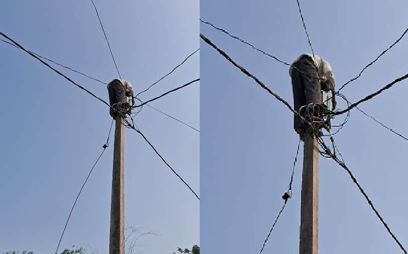 Rae Bareli News: Workers working on electric poles without safety belts.